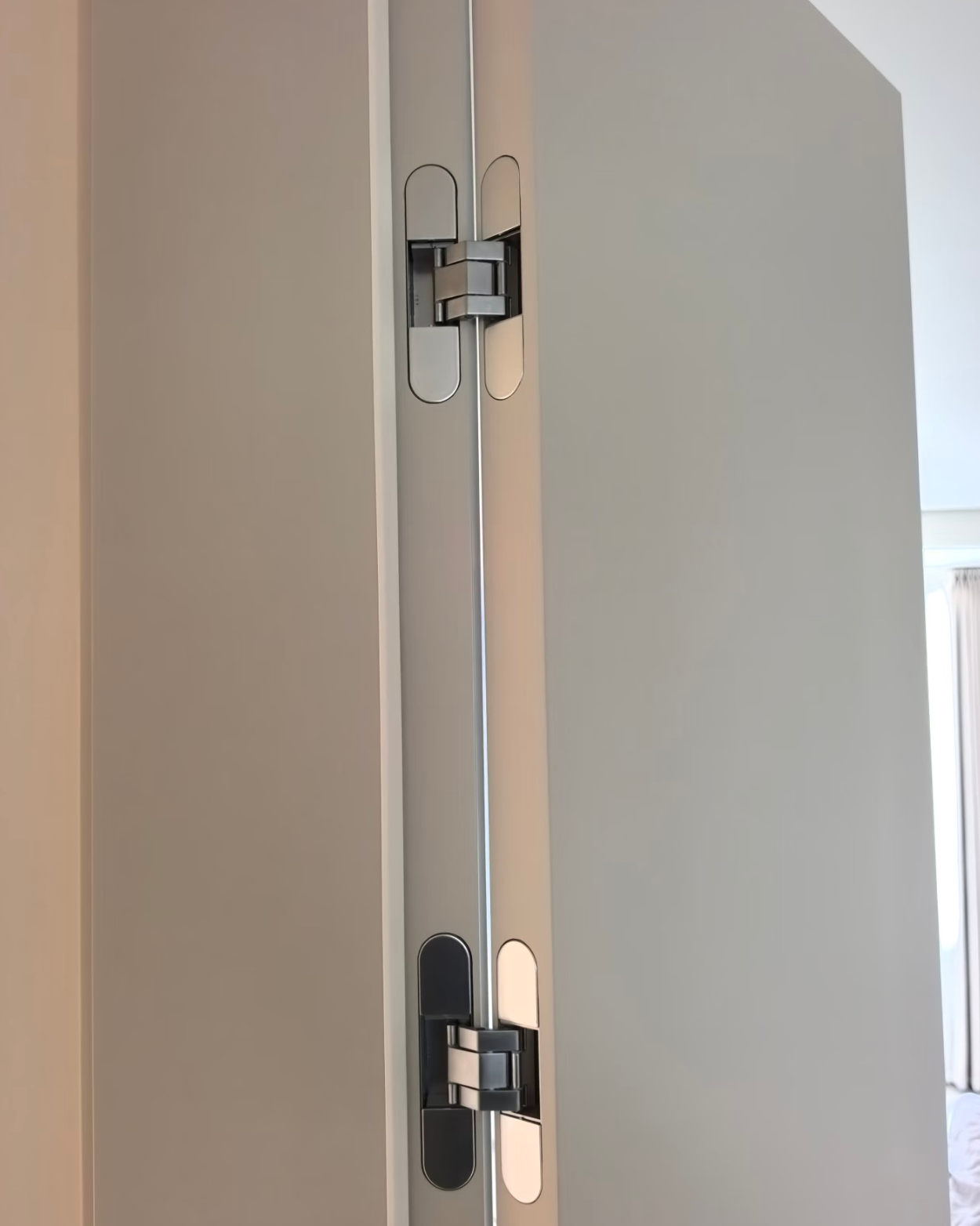 Heavy duty concealed hinges for hidden wall panel doors