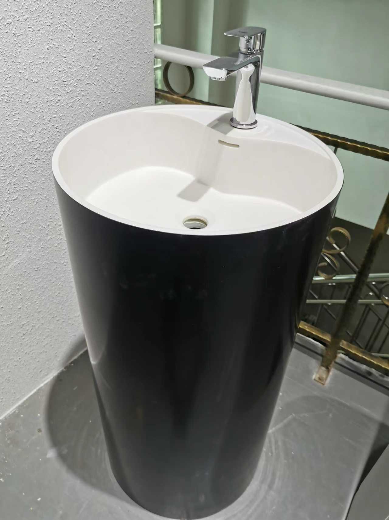 Wood tone bathroom vanity with integrated basin in Singapore